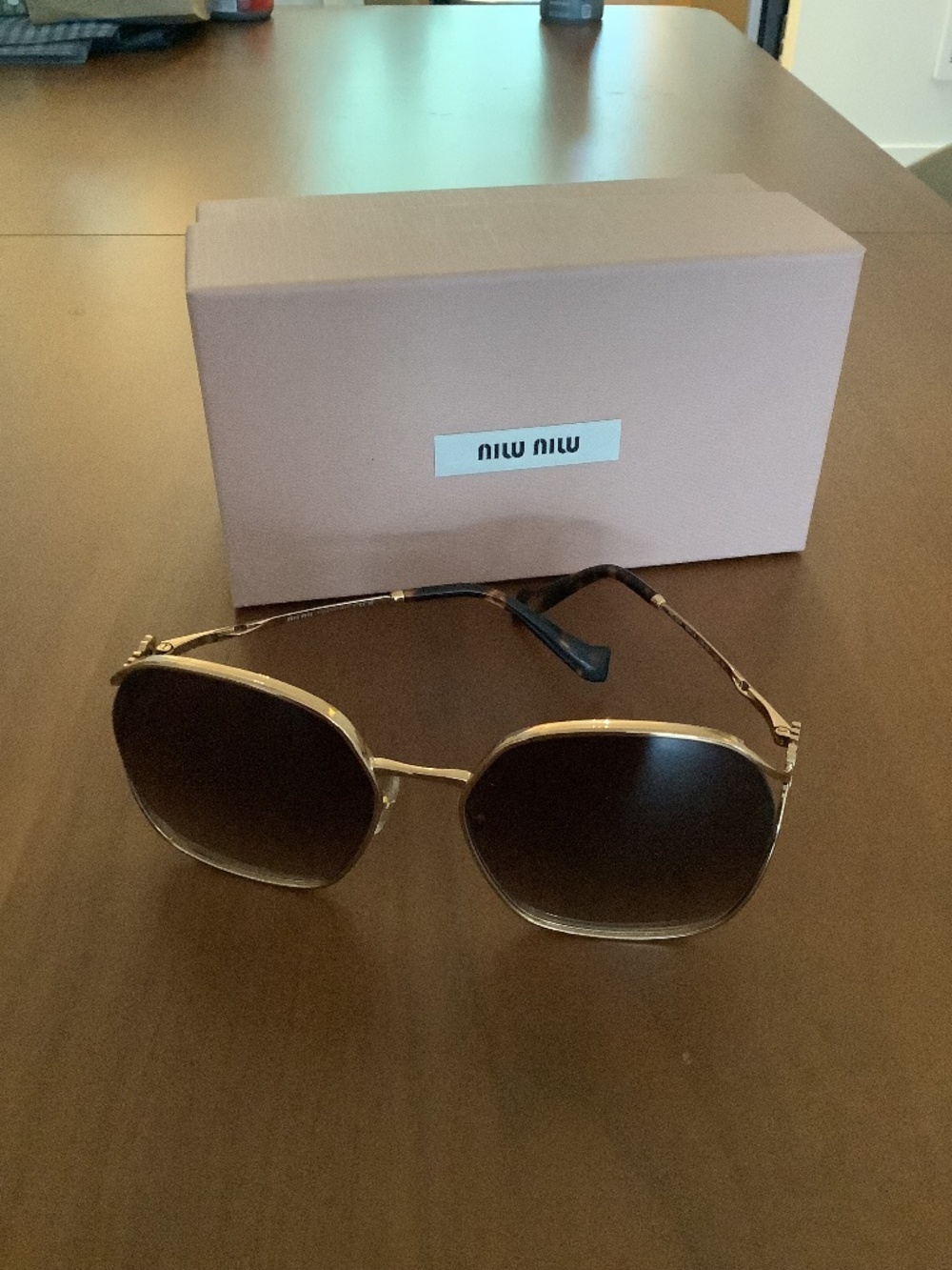 Miu Miu Butterfly sunglasses